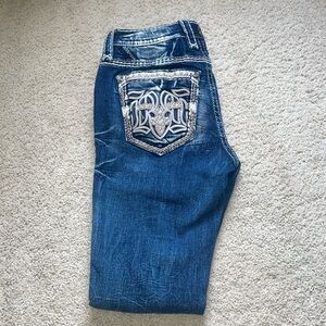 Buckle Rock Revival jeans 
SIZE: 25
MID RISE SKINNY FIT 
BARELY WORN